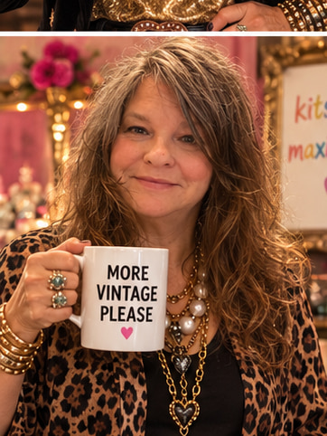 Stacie in a leopard-print cardigan holding a mug that reads More Vintage Please